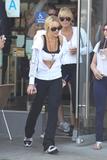 LindsayLohan.us 0072e5becfe39918b1146b58762e74cd Lindsay Lohan   wearing a sports bra at a Coffee Bean & Tea Leaf in LA 07/09/10 Lindsay Lohan Pictures and videos