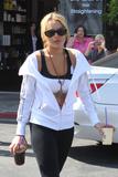 LindsayLohan.us 015011c8065adac1c76e791b462258cf Lindsay Lohan   wearing a sports bra at a Coffee Bean & Tea Leaf in LA 07/09/10 Lindsay Lohan Pictures and videos
