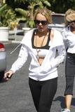 LindsayLohan.us 062710334767354f69cf22ab1cf080a5 Lindsay Lohan   wearing a sports bra at a Coffee Bean & Tea Leaf in LA 07/09/10 Lindsay Lohan Pictures and videos