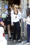 LindsayLohan.us 0798ba2a356ef4ba6e3ad0568517440a Lindsay Lohan   wearing a sports bra at a Coffee Bean & Tea Leaf in LA 07/09/10 Lindsay Lohan Pictures and videos