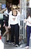 LindsayLohan.us 0baa6d28ce2ec87e2adf8097b5df121f Lindsay Lohan   wearing a sports bra at a Coffee Bean & Tea Leaf in LA 07/09/10 Lindsay Lohan Pictures and videos