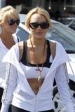 LindsayLohan.us 225545af806f1091ce6347024ead0c67 Lindsay Lohan   wearing a sports bra at a Coffee Bean & Tea Leaf in LA 07/09/10 Lindsay Lohan Pictures and videos