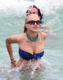 LindsayLohan.us 33cfec3c863e39f0cd02b582805897f3 Lindsay Lohan   In Bikini on Miami Beach BOOB Slip   May 23,2011 Lindsay Lohan Pictures and videos