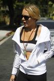 LindsayLohan.us 3930f5c5695be894e0846272a0e0ac2f Lindsay Lohan   wearing a sports bra at a Coffee Bean & Tea Leaf in LA 07/09/10 Lindsay Lohan Pictures and videos