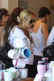 LindsayLohan.us 3b97a24976a8d53fe68b80ede07ae905 Lindsay Lohan   wearing a sports bra at a Coffee Bean & Tea Leaf in LA 07/09/10 Lindsay Lohan Pictures and videos