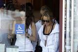 LindsayLohan.us 409befa2b349f73c9cbc80a3bad2065d Lindsay Lohan   wearing a sports bra at a Coffee Bean & Tea Leaf in LA 07/09/10 Lindsay Lohan Pictures and videos