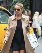 LindsayLohan.us 41035621ac5b800943fed542cc923f4e Lindsay Lohan, leggy in knee high socks shopping in Soho   9/May/12  Lindsay Lohan Pictures and videos
