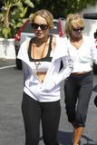 LindsayLohan.us 41e41a0a1e7f3c4912dd354cebd6a7ef Lindsay Lohan   wearing a sports bra at a Coffee Bean & Tea Leaf in LA 07/09/10 Lindsay Lohan Pictures and videos