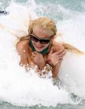 LindsayLohan.us 4b72f940c9f42ed513ad3b349ed288af Lindsay Lohan   In Bikini on Miami Beach BOOB Slip   May 23,2011 Lindsay Lohan Pictures and videos