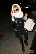 LindsayLohan.us 4d8e8f82bcb906510a24c8f74fd0241d Lindsay Lohan   at LAX airport in Los Angeles 04/27/12 Lindsay Lohan Pictures and videos