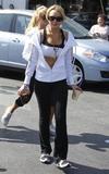 LindsayLohan.us 68a7fe78abaaf71a5550265d4f577f7e Lindsay Lohan   wearing a sports bra at a Coffee Bean & Tea Leaf in LA 07/09/10 Lindsay Lohan Pictures and videos