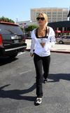 LindsayLohan.us 6f414e5c055183da6a93b716cba55e01 Lindsay Lohan   wearing a sports bra at a Coffee Bean & Tea Leaf in LA 07/09/10 Lindsay Lohan Pictures and videos