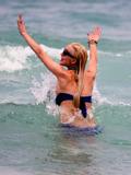 LindsayLohan.us 6f98cd0dd1fbc56364e33967c9e2bd11 Lindsay Lohan   In Bikini on Miami Beach BOOB Slip   May 23,2011 Lindsay Lohan Pictures and videos