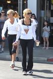 LindsayLohan.us 7ad1cb56e3781a2584a190b758b32dcb Lindsay Lohan   wearing a sports bra at a Coffee Bean & Tea Leaf in LA 07/09/10 Lindsay Lohan Pictures and videos