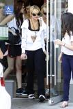 LindsayLohan.us 84a6c6e2f55cdd226f33c0dee9b616e4 Lindsay Lohan   wearing a sports bra at a Coffee Bean & Tea Leaf in LA 07/09/10 Lindsay Lohan Pictures and videos