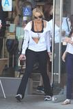 LindsayLohan.us 8a105a214f3d6c2a52274a096447f11f Lindsay Lohan   wearing a sports bra at a Coffee Bean & Tea Leaf in LA 07/09/10 Lindsay Lohan Pictures and videos