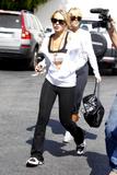 LindsayLohan.us b5aac09d33d51d78362a0f328b65d09e Lindsay Lohan   wearing a sports bra at a Coffee Bean & Tea Leaf in LA 07/09/10 Lindsay Lohan Pictures and videos
