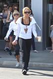 LindsayLohan.us bb4613b2db8fcb9bfc2c43c5f04313c9 Lindsay Lohan   wearing a sports bra at a Coffee Bean & Tea Leaf in LA 07/09/10 Lindsay Lohan Pictures and videos