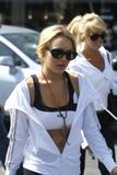 LindsayLohan.us dd453327cab6805052c00a6367227061 Lindsay Lohan   wearing a sports bra at a Coffee Bean & Tea Leaf in LA 07/09/10 Lindsay Lohan Pictures and videos